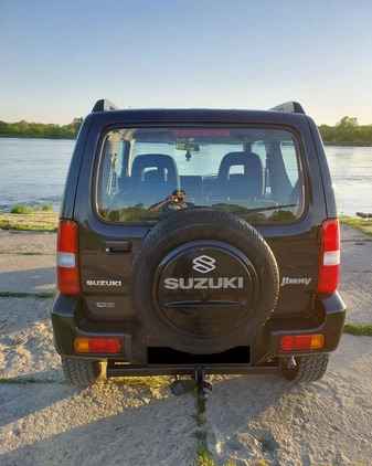 Suzuki Jimny cena 26500 przebieg: 242700, rok produkcji 2003 z Puławy małe 277